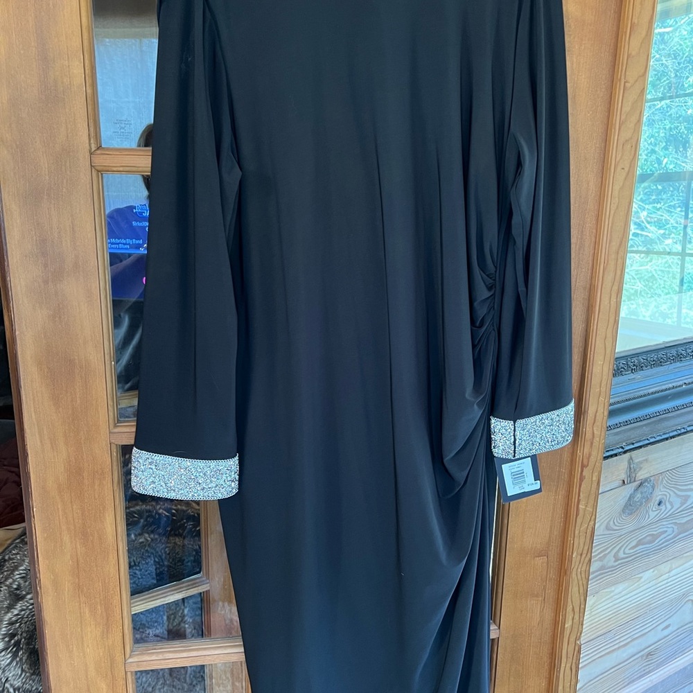 Women’s Marina cocktail dress. Scoop back. Knee length. New with tags